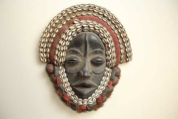 Dan Mask- Ceremonial rattle adorned with Cowry Shells
