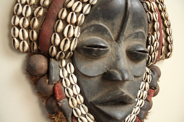 Dan Mask- Ceremonial rattle adorned with Cowry Shells