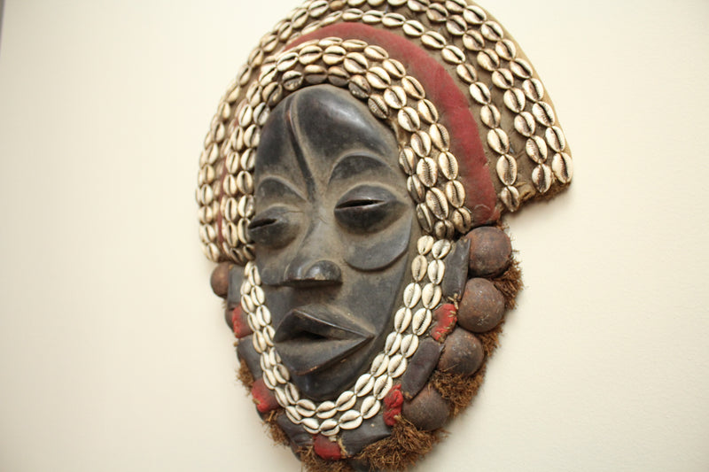 Dan Mask- Ceremonial rattle adorned with Cowry Shells